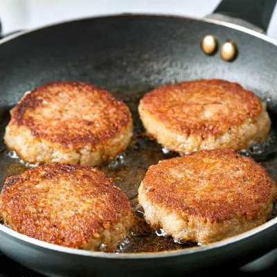 Karbonader (Lean Beef Patties) with Caramelized Onions